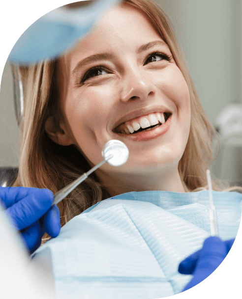 Smiling woman during periodontal therapy visit